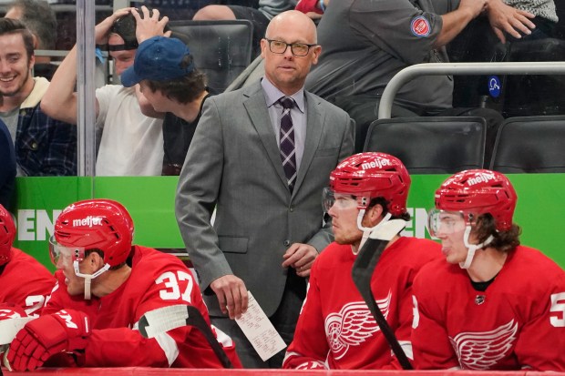 Red Wings coach Jeff Blashill watches during a preseason game against the Blackhawks on Oct. 4, 2021, in Detroit. (AP Photo/Paul Sancya)