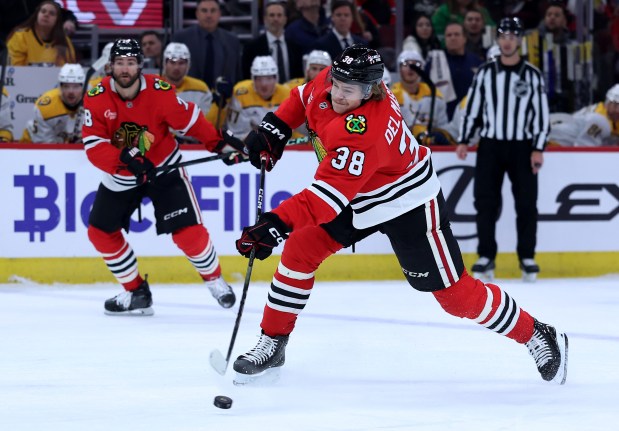 Blackhawks defenseman Ethan Del Mastro takes a shot against the Predators on Feb. 7, 2025, at the United Center. (Chris Sweda/Chicago Tribune)