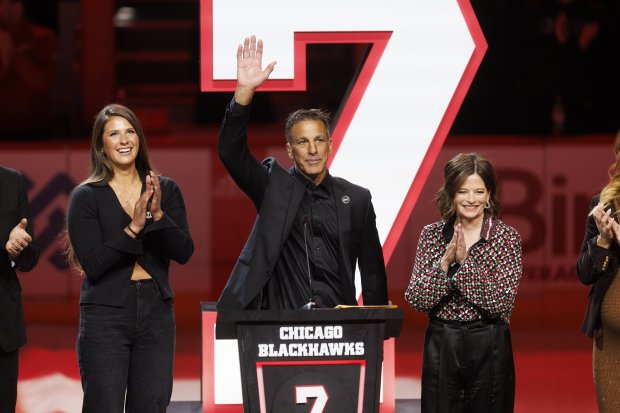 Chris Chelios and his family attend a ceremony to retire his No. 7 jersey before a Blackhawks-Red Wings game on Feb. 25, 2024, at the United Center. (Armando L. Sanchez/Chicago Tribune)