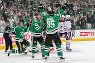 Dallas Stars center Matt Duchene (95) celebrates after a goal with center Wyatt Johnston...