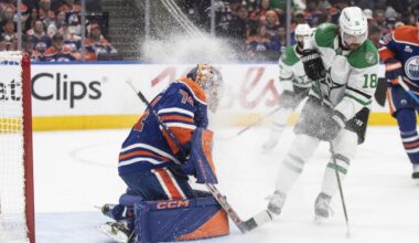 Dallas Stars' Sam Steel (18) sprays Edmonton Oilers goalie Stuart Skinner (74) with ice during the first period of Game 3 of the NHL hockey Stanley Cup Western Conference finals in Edmonton, Alberta, Sunday, May 25, 2025. (Jason Franson/The Canadian Press via AP)