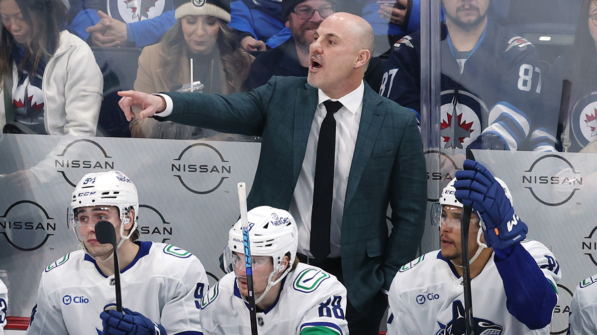 Vancouver Canucks head coach Rick Tocchet gestures during a game against the Winnipeg Jets in the third period at Canada Life Centre.