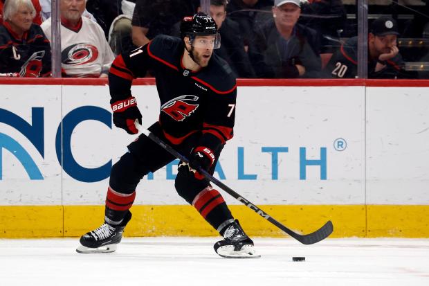 Hurricanes forward Taylor Hall controls the puck against the Panthers during Game 1 of the Eastern Conference finals Tuesday, May 20, 2025, in Raleigh, N.C. (AP Photo/Karl DeBlaker)