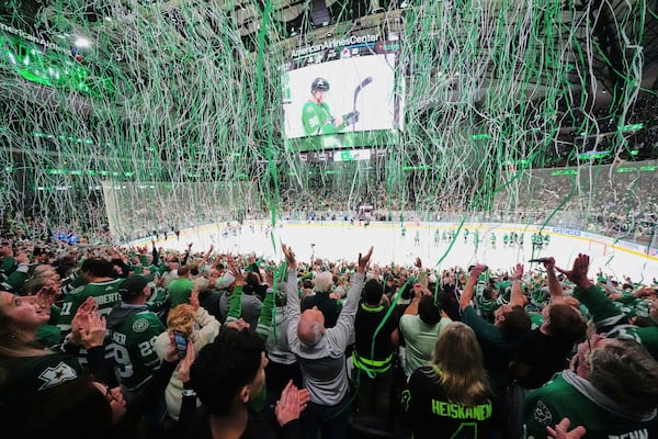 Dallas Stars' Mikko Rantanen is shown on the large video board as fans celebrate the Stars 4-2 win against the Colorado Avalanche in Game 7 of a first-round NHL hockey playoff series Saturday, May 3, 2025, in Dallas. (AP Photo/Julio Cortez)