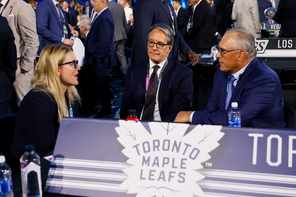 Assistant general manager Hayley Wickenheiser, President and Alternate Governor Brendan Shanahan and head coach Craig Berube of the Toronto Maple Leafs attend the first round of the 2024 Upper Deck NHL Draft