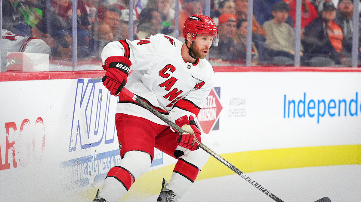 Carolina Hurricanes defenseman Jaccob Slavin (74) controls the puck against the Philadelphia Flyers in the second period at Wells Fargo Center.