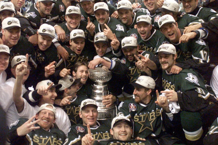 File photo: The Dallas Stars celebrate with the Stanley Cup after the third OT of Game 6 of...