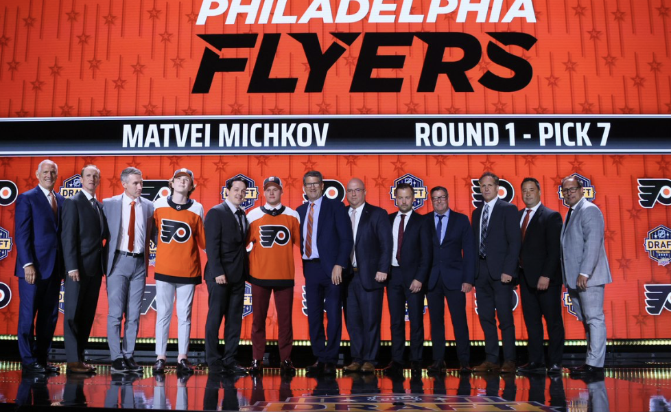 Matvei Michkov on stage at draft (AP Photo)