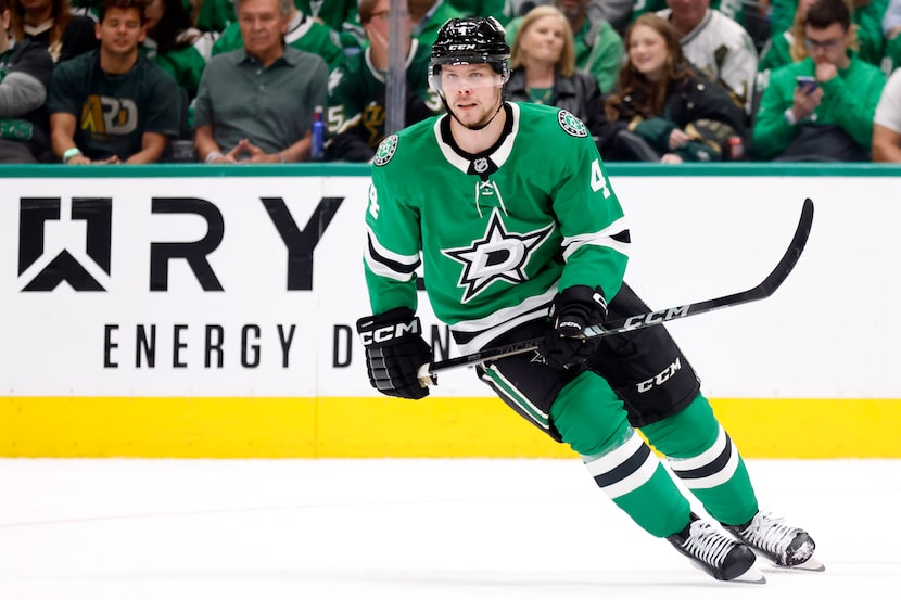 Dallas Stars defenseman Miro Heiskanen (4) turns up ice against the Winnipeg Jets during the...