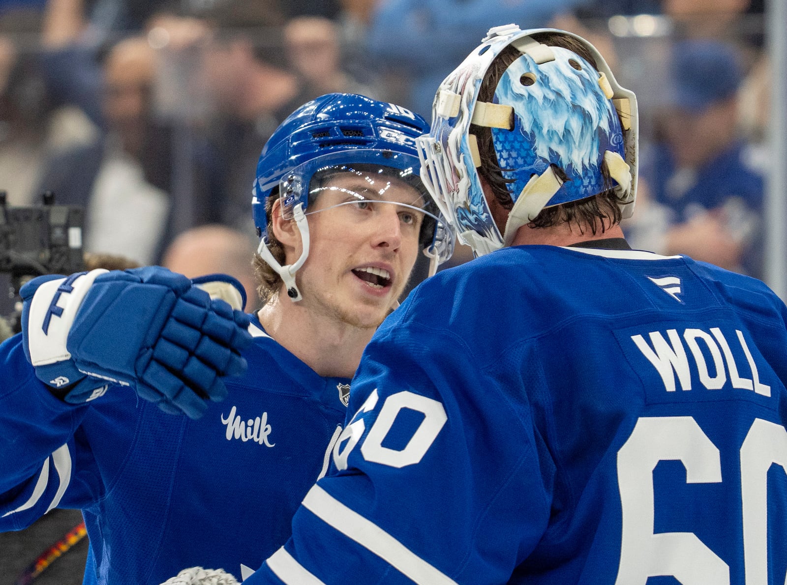 Toronto Maple Leafs' Mitch Marner (16) celebrates with goaltender Joseph Woll (60) after defeating the Florida Panthers in NHL playoff hockey action in Toronto on Wednesday, May 7, 2025. (Frank Gunn/The Canadian Press via AP)