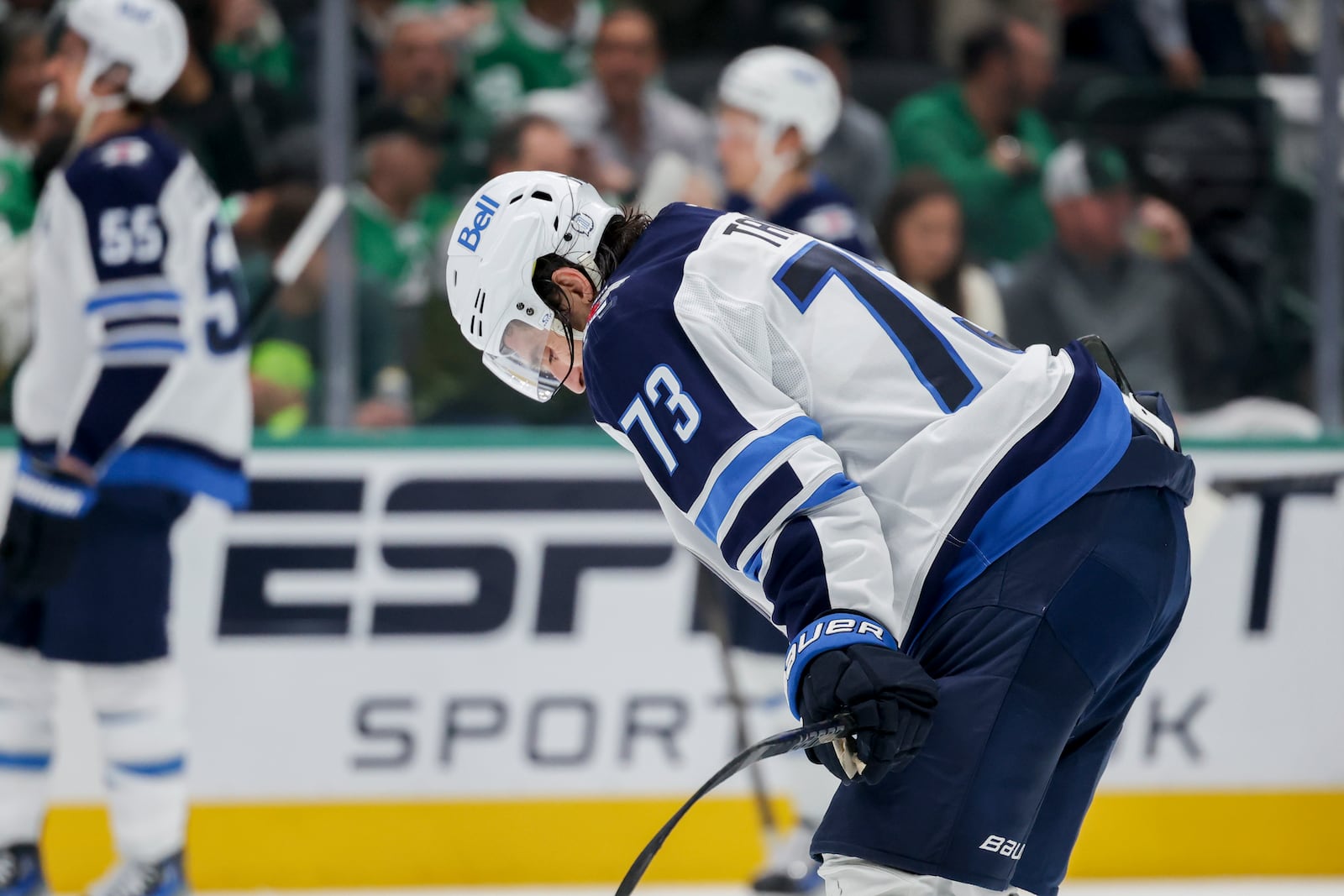 Winnipeg Jets left wing Brandon Tanev (73) reacts at the end of the second period of Game 4 of a second-round NHL hockey playoff series in Dallas, Tuesday, May 13, 2025. (AP Photo/Gareth Patterson)