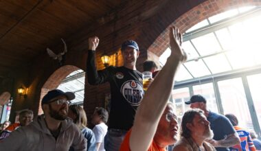At Vancouver’s unofficial Oilers bar, Edmonton fans find a little piece of home during the playoffs