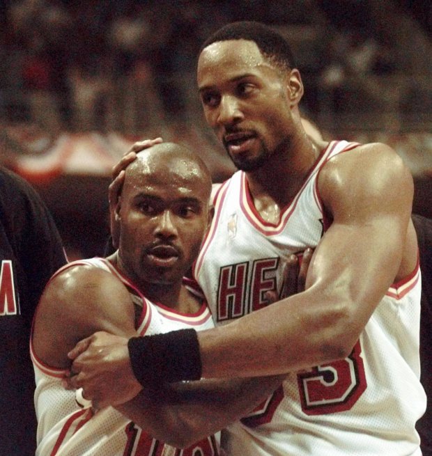 Miami Heat center Alonzo Mourning, right, congratulates guard Tim Hardaway after he made key points against the Knicks at the end of the first half at the Miami Arena Friday, May 9, 1997. (AP Photo/Rick Bowmer)