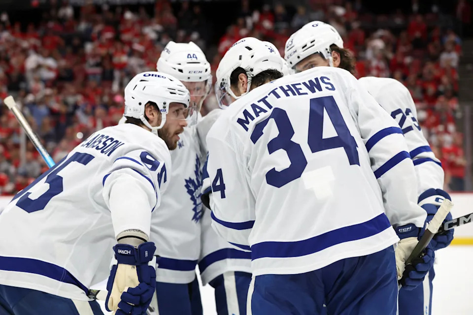 Maple Leafs center Auston Matthews (34) talks with Oliver Ekman-Larsson (95), Morgan Rielly (44), Matthew Knies (23) and Mitch Marner (16).Kim Klement Neitzel-Imagn Images