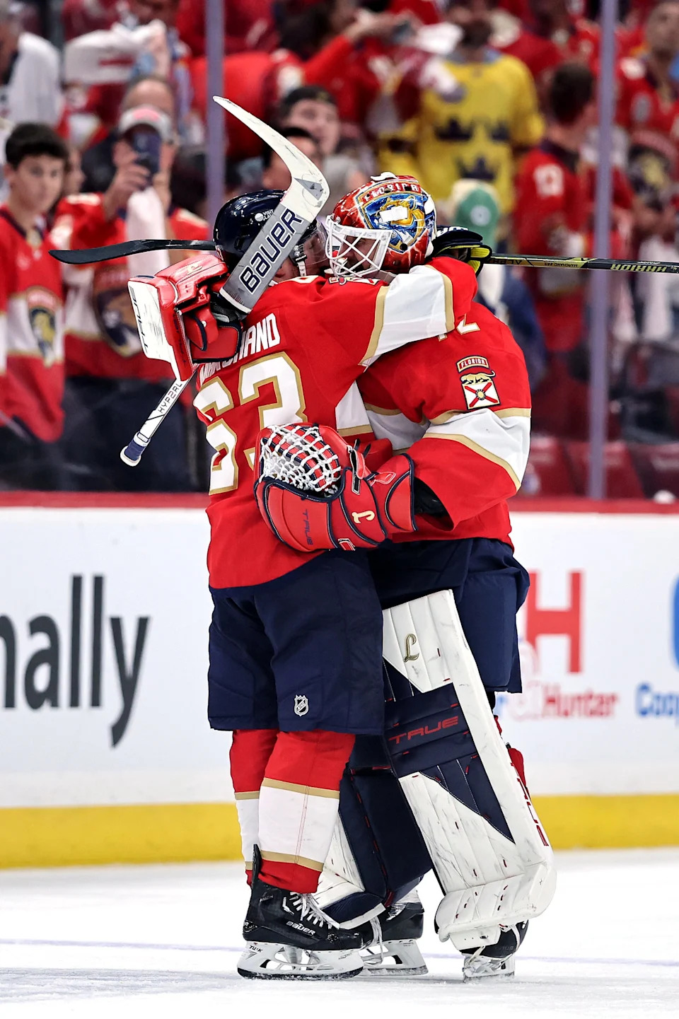 SUNRISE, FLORIDA - MAY 09: Brad Marchand #63 and Sergei Bobrovsky #72 of the Florida Panthers celebrate after defeating the Toronto Maple Leafs in overtime to win Game Three of the Second Round of the 2025 Stanley Cup Playoffs at Amerant Bank Arena on May 09, 2025 in Sunrise, Florida. (Photo by Carmen Mandato/Getty Images)