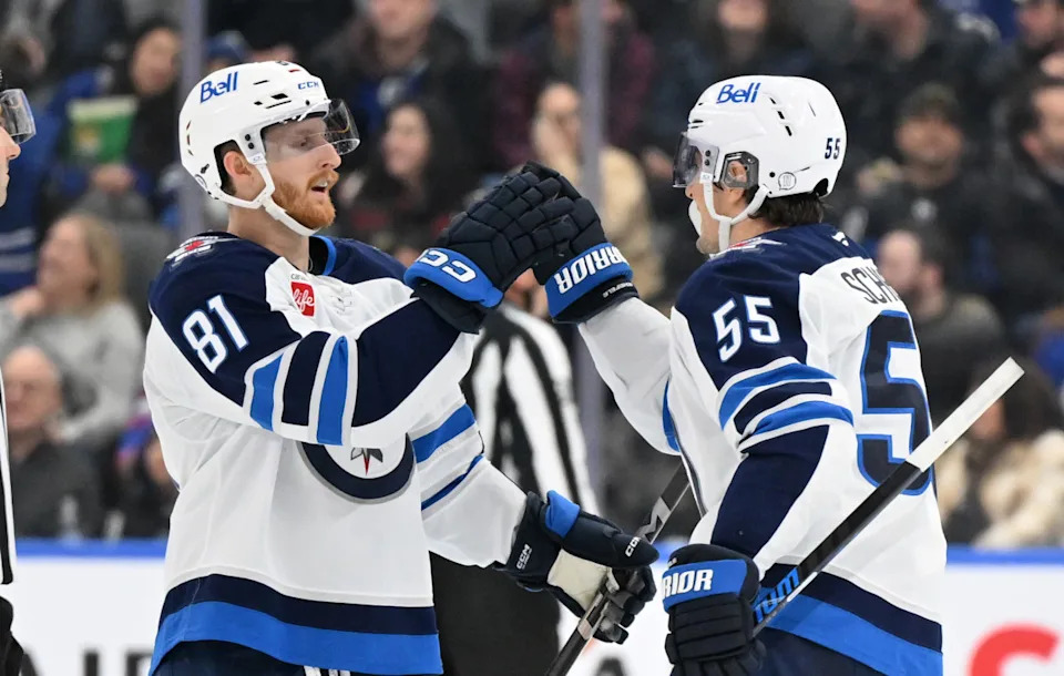 Winnipeg Jets forward Mark Scheifele (55) celebrates with Kyle Connor (81) after scoring a goal at Scotiabank Arena.Dan Hamilton-Imagn Images
