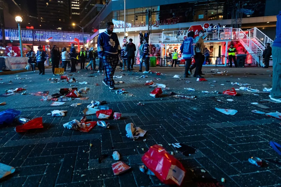 Fans leave Maple Leafs Square in disarray following the Toronto Maple Leafs’ loss to the Florida Panthers in NHL Stanley Cup playoff hockey game at a tailgate event outside Scotiabank Arena, in Toronto on Sunday, May 18, 2025. AP