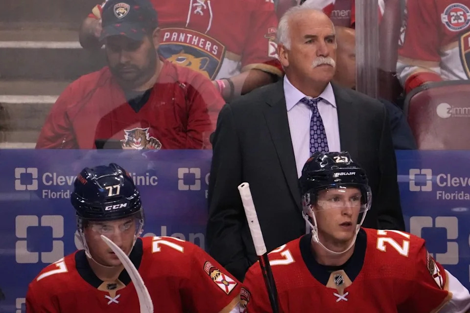 Florida Panthers head coach Joel Quenneville watches from behind the bench during the first period between the Florida Panthers and the Boston Bruins at FLA Live Arena. Jasen Vinlove-Imagn Images