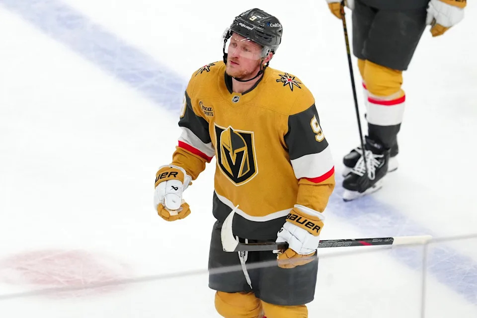 Vegas Golden Knights center Jack Eichel (9) celebrates after scoring an empty net goal against the Detroit Red Wings during the third period at T-Mobile Arena. Stephen R. Sylvanie-Imagn Images