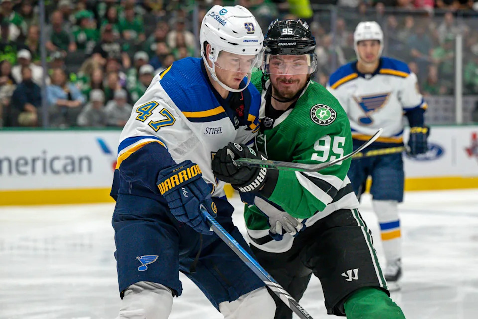 St. Louis Blues defenseman Torey Krug (47) and Dallas Stars center Matt Duchene (95) battle for control of the puck during the second period at the American Airlines Center.Jerome Miron-Imagn Images