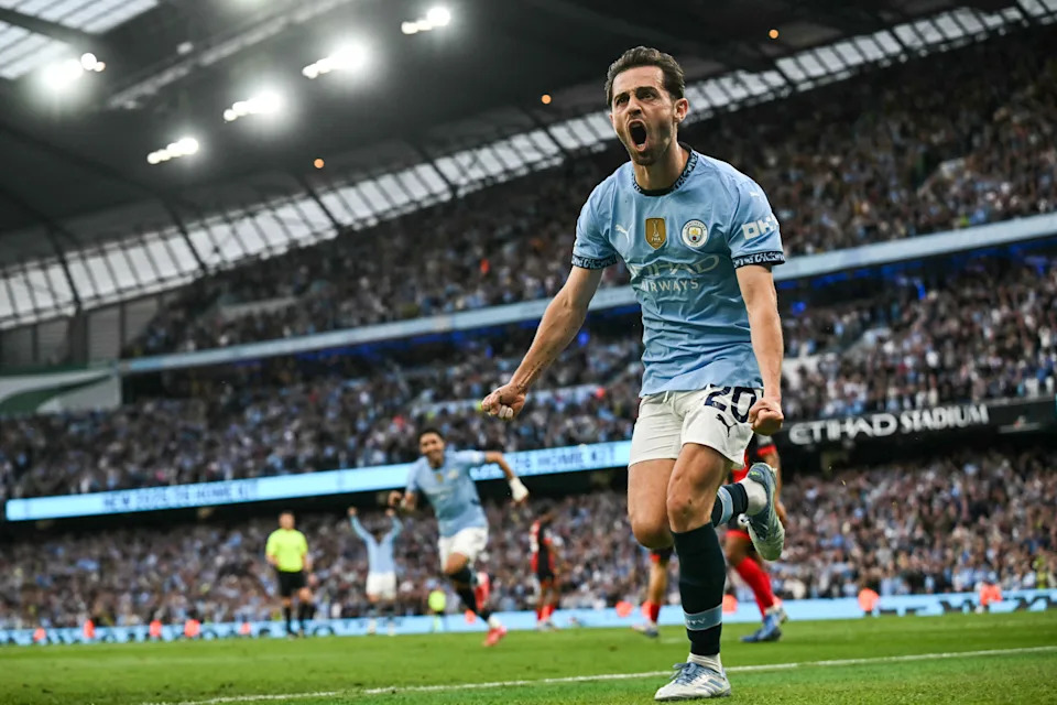 Bernardo Silva celebrates after scoring City's second goal on Tuesday. (Paul Ellis/AFP via Getty Images)