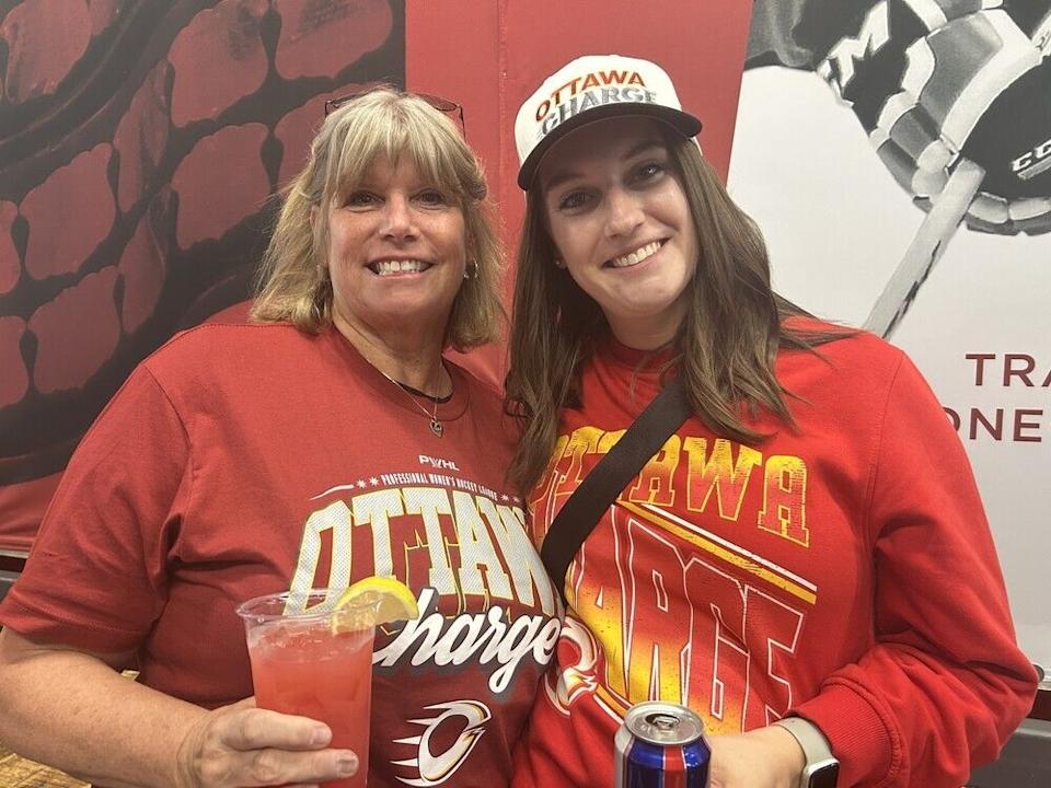  Donna Penny, left, and Courtney Hynes in attendance at the first Ottawa Charge home playoff game against the Montreal Victoire at TD Place on Tuesday.
