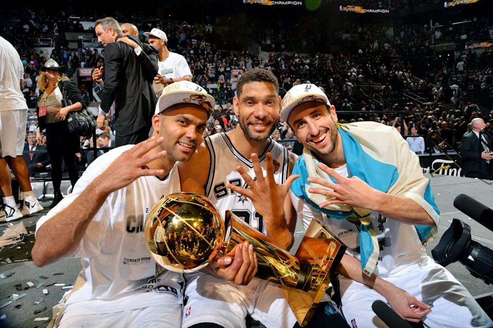 Tony Parker, Tim Duncan and Manu Ginobili celebrate San Antonio's fifth title. (Jesse D. Garrabrant/NBAE via Getty Images)