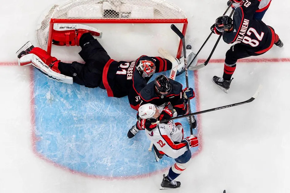 Carolina Hurricanes goalie Frederik Andersen (31) clears a scoring attempt by Washington Capitols left wing Anthony Beauvillier (72) in the first period during Game 3 of their series on Saturday, May 10, 2025 at Lenovo Center in Raleigh, N.C. Robert Willett/rwillett@newsobserver.com