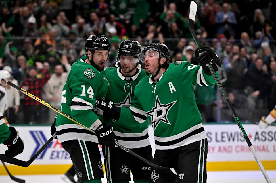 Dallas Stars left wing Jamie Benn (14), defenseman Miro Heiskanen (4), and center Matt Duchene (95) celebrate a goal at the American Airlines Center.Jerome Miron-Imagn Images