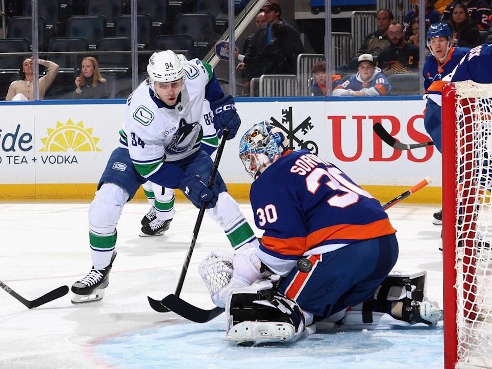 Goalie Ilya Sorokin of the Islanders denies Canucks winger Linus Karlsson during a March 26 meeting in Elmont, N.Y.