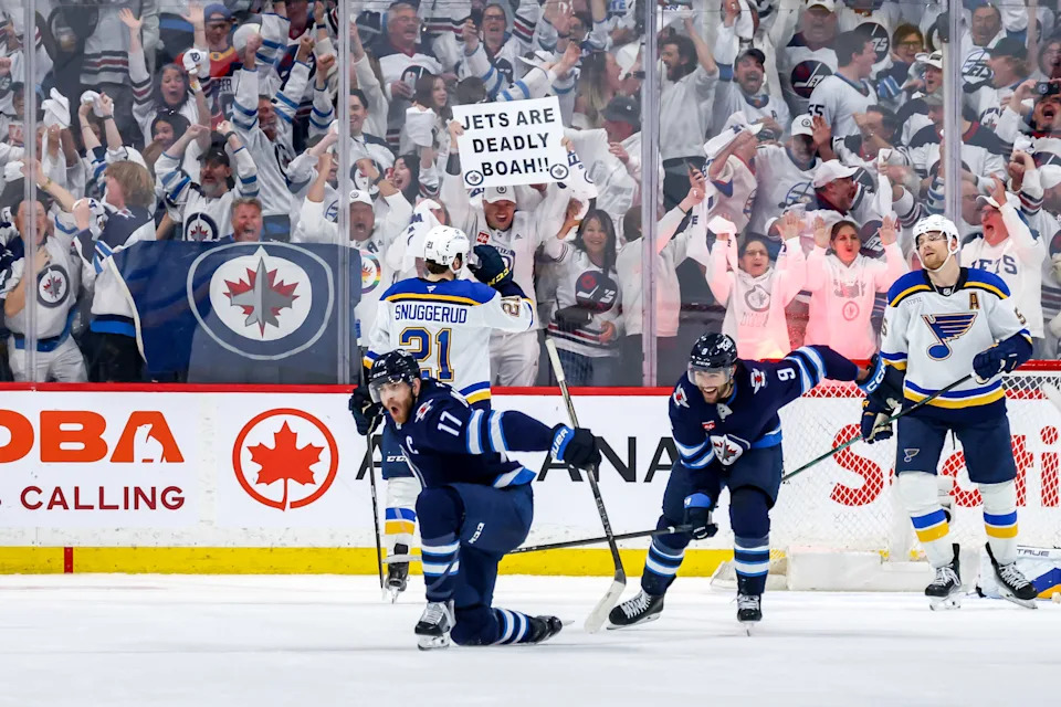 Adam Lowry celebrates his series-winning goal. (Jonathan Kozub/NHLI via Getty Images)