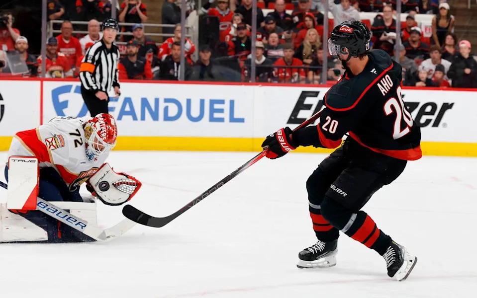 Panthers’ Sergei Bobrovsky (72) makes the save on a shot by Carolina’s Sebastian Aho (20) during the first period of the Carolina Hurricanes’ game against the Florida Panthers in Game 1 of the Eastern Conference Finals at the Lenovo Center in Raleigh, N.C., Tuesday, May 20, 2025.