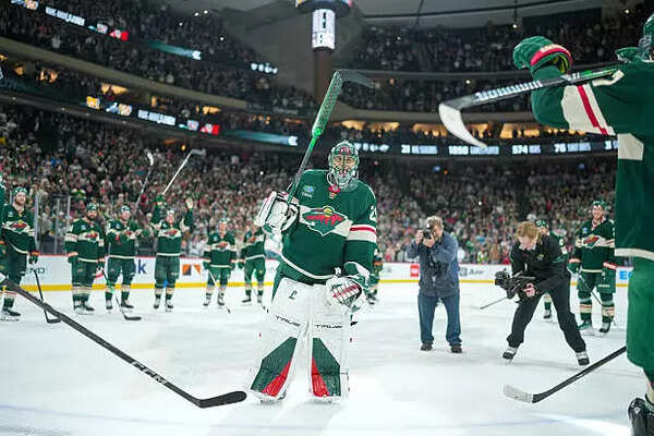 Marc-Andre Fleury #29 of the Minnesota Wild salutes the crowd after an overtime win