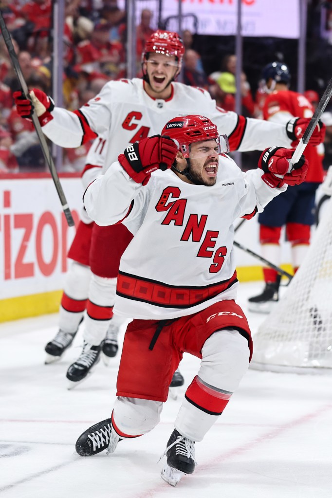 Logan Stankoven of the Carolina Hurricanes celebrating after scoring a goal against the Florida Panthers during Game Three of the Eastern Conference Final of the 2025 Stanley Cup Playoffs