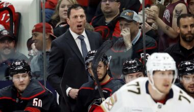 Carolina Hurricanes head coach Rod Brind'Amour watches from the bench during the first period of Game 1 of the NHL hockey Stanley Cup Eastern Conference finals against the Florida Panthers in Raleigh, N.C., Tuesday, May 20, 2025. (AP Photo/Karl DeBlaker)
