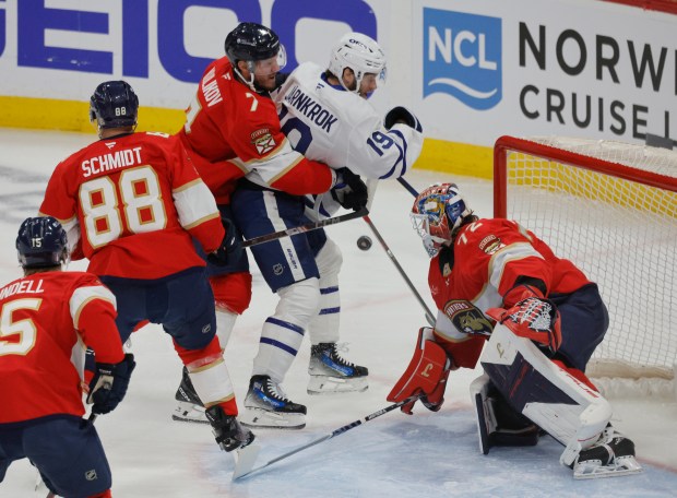Florida Panthers defenseman Dmitry Kulikov (7) and Florida Panthers defenseman...