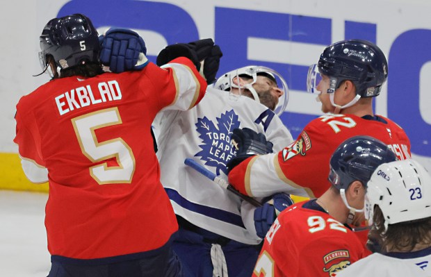 Florida Panthers defensemen Aaron Ekblad (5) and Gustav Forsling (42)...