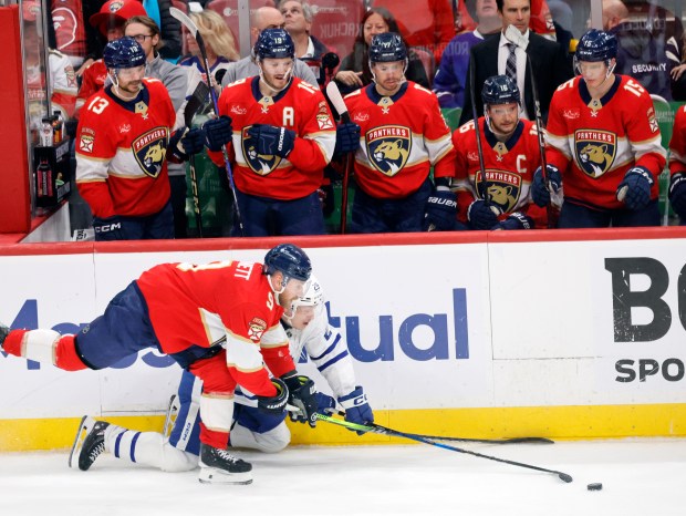 Florida Panthers center Sam Bennett (9) and Toronto Maple Leafs...