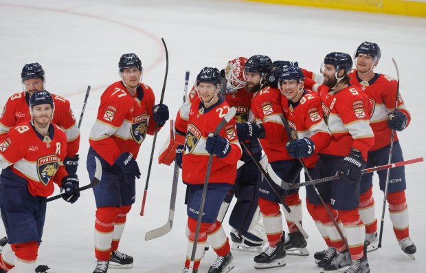 Florida Panthers celebrate the overtime win against the Toronto Maple...