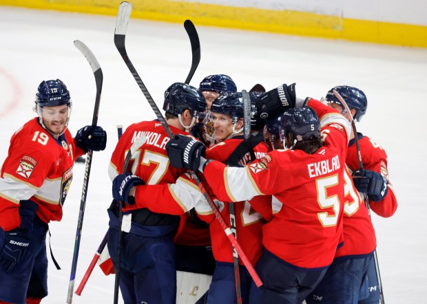 Florida Panthers celebrate their overtime win in Game 3 of...