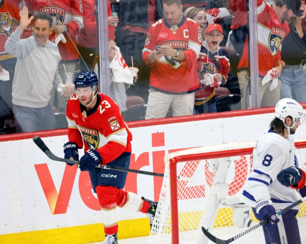 Florida Panthers center Carter Verhaeghe (23) skates after scoring a...