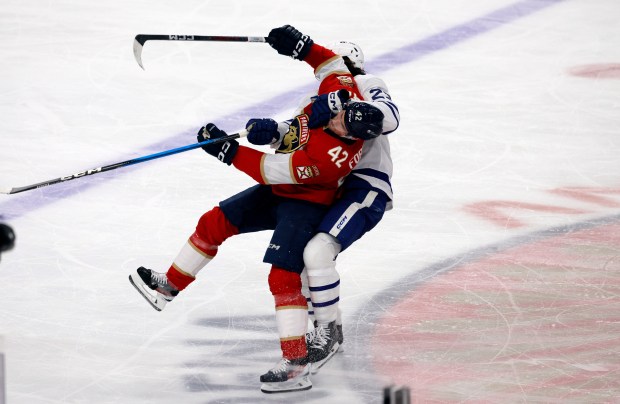 Florida Panthers defenseman Gustav Forsling (42) and Toronto Maple Leafs...