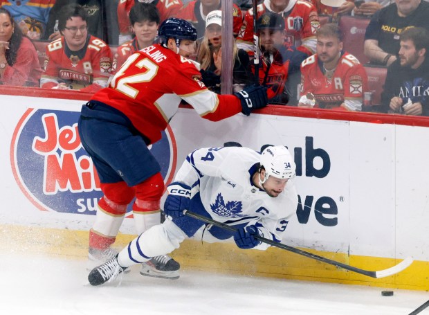 Florida Panthers defenseman Gustav Forsling (42) and Toronto Maple Leafs...