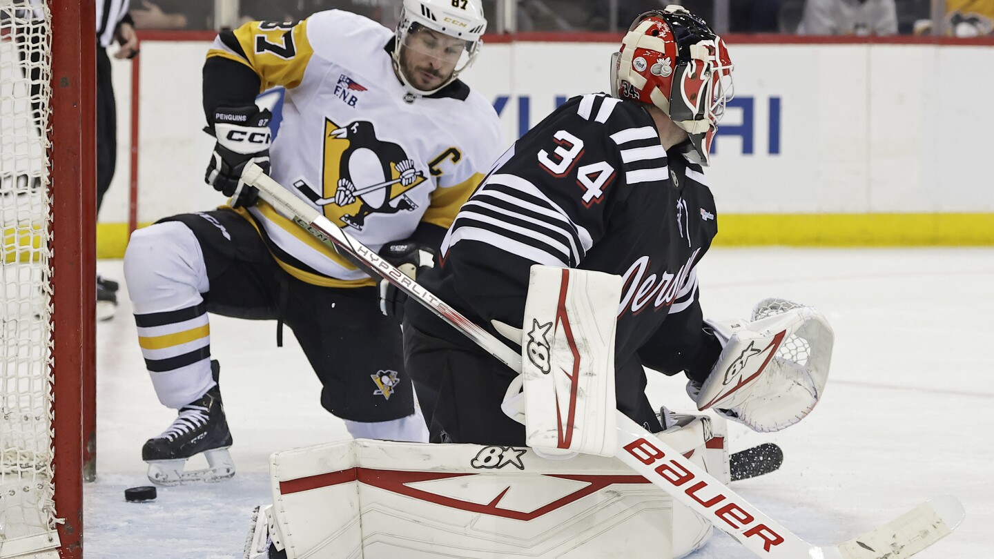 Crosby, Malkin help Penguins rally from 2 goals down to beat Devils 4-2