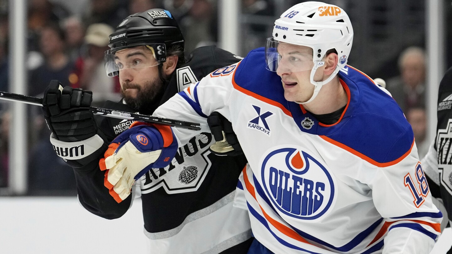 Kings blow a 4-goal lead before Danault scores the last-minute winner in 6-5 opening win over Oilers