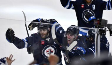 Lowry scores late in 2OT to rally Jets to 4-3 win over Blues in Game 7 to advance to 2nd round