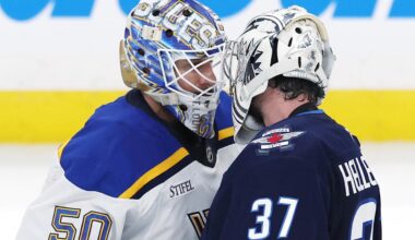 May 4, 2025; Winnipeg, Manitoba, CAN; St. Louis Blues goaltender Jordan Binnington (50) and Winnipeg Jets goaltender Connor Hellebuyck (37) shake hands after the Winnipeg Jets won in double overtime of game seven of the first round of the 2025 Stanley Cup Playoffs at Canada Life Centre. Mandatory Credit: James Carey Lauder-Imagn Images