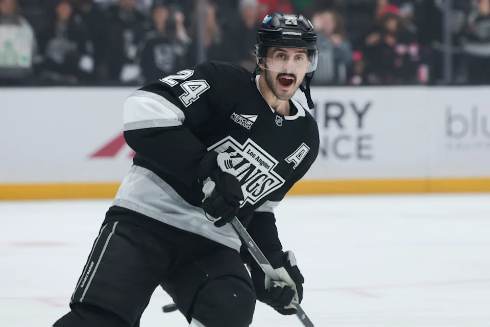 Los Angeles Kings center Phillip Danault (24) reacts while warming up at Crypto.com Arena.Jessica Alcheh-Imagn Images