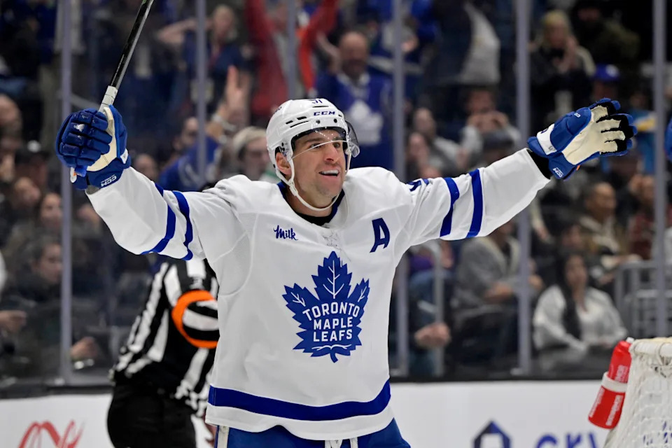 Toronto Maple Leafs center John Tavares (91) celebrates after scoring a goal.Jayne Kamin-Oncea-Imagn Images