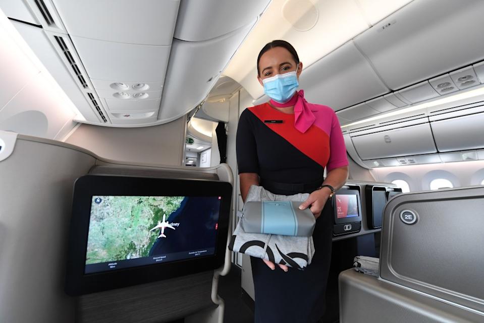 Flyers can ask flight attendants for their free PJs if they aren’t offered them. Getty Images